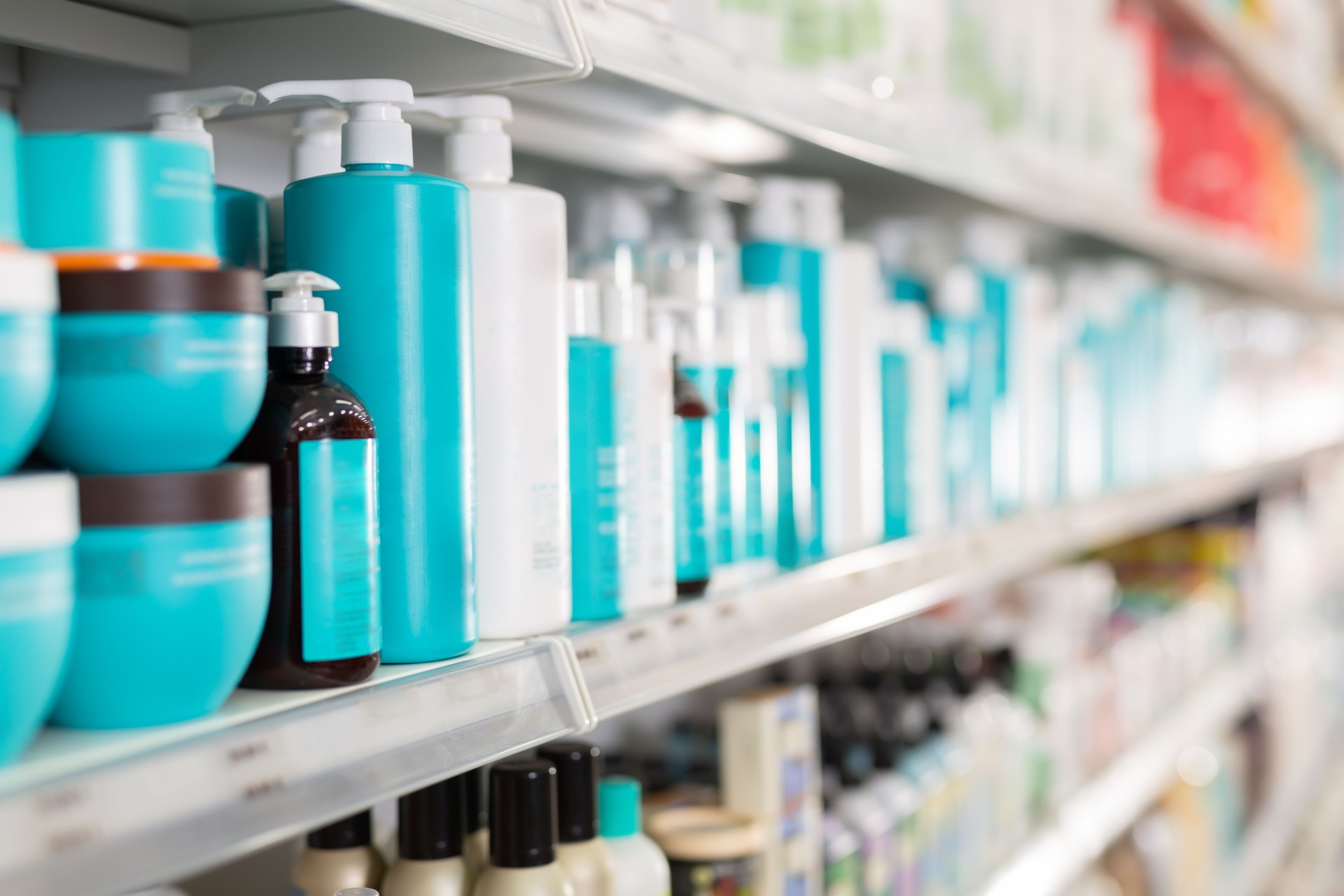 Hair care products on store shelves in supermarket
